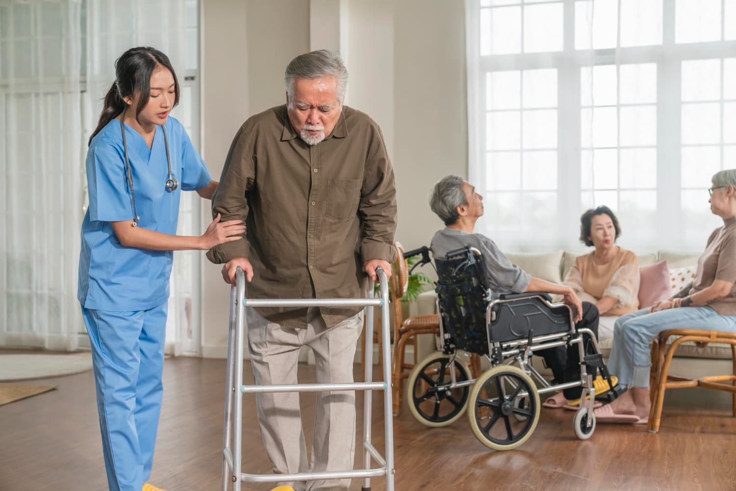 Elderly caregiver assisting a senior citizen at home in Bangalore